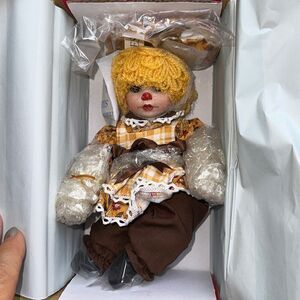 New in box Marie Osmond  Rag A Muffin Banana Nut Tiny Tot porcelain doll‎